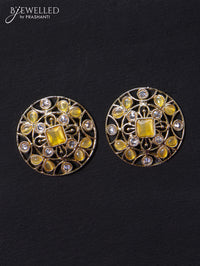 Light weight floral design earrings with cz and yellow stone