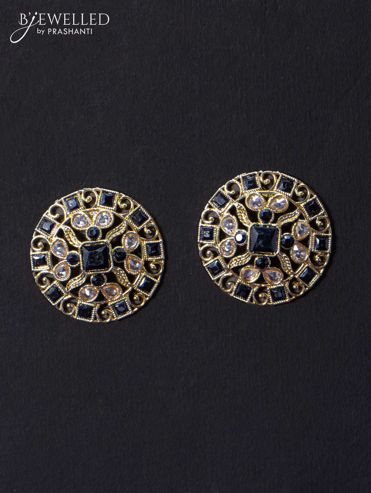 Light weight floral design earrings with cz and black stone