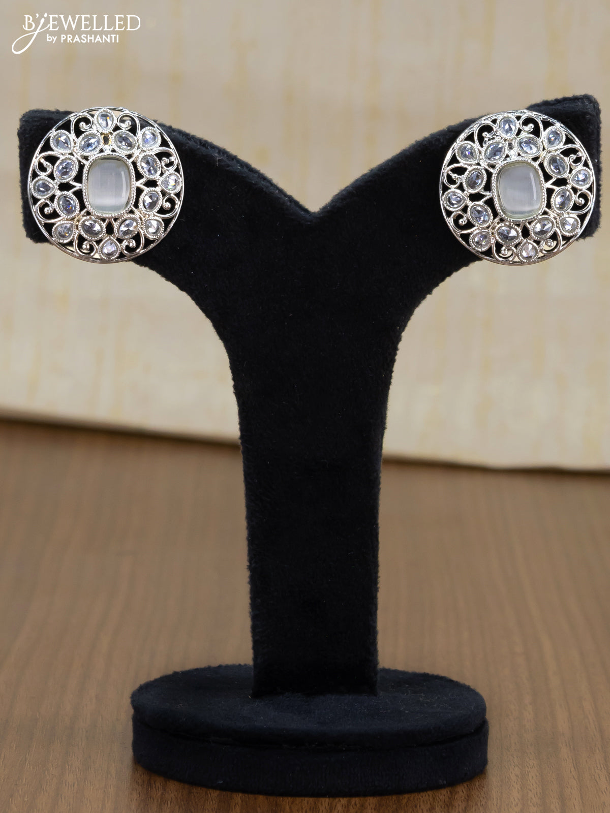 Light weight floral design earrings with cz stone