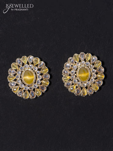 Light weight floral design earrings with cz and yellow stone