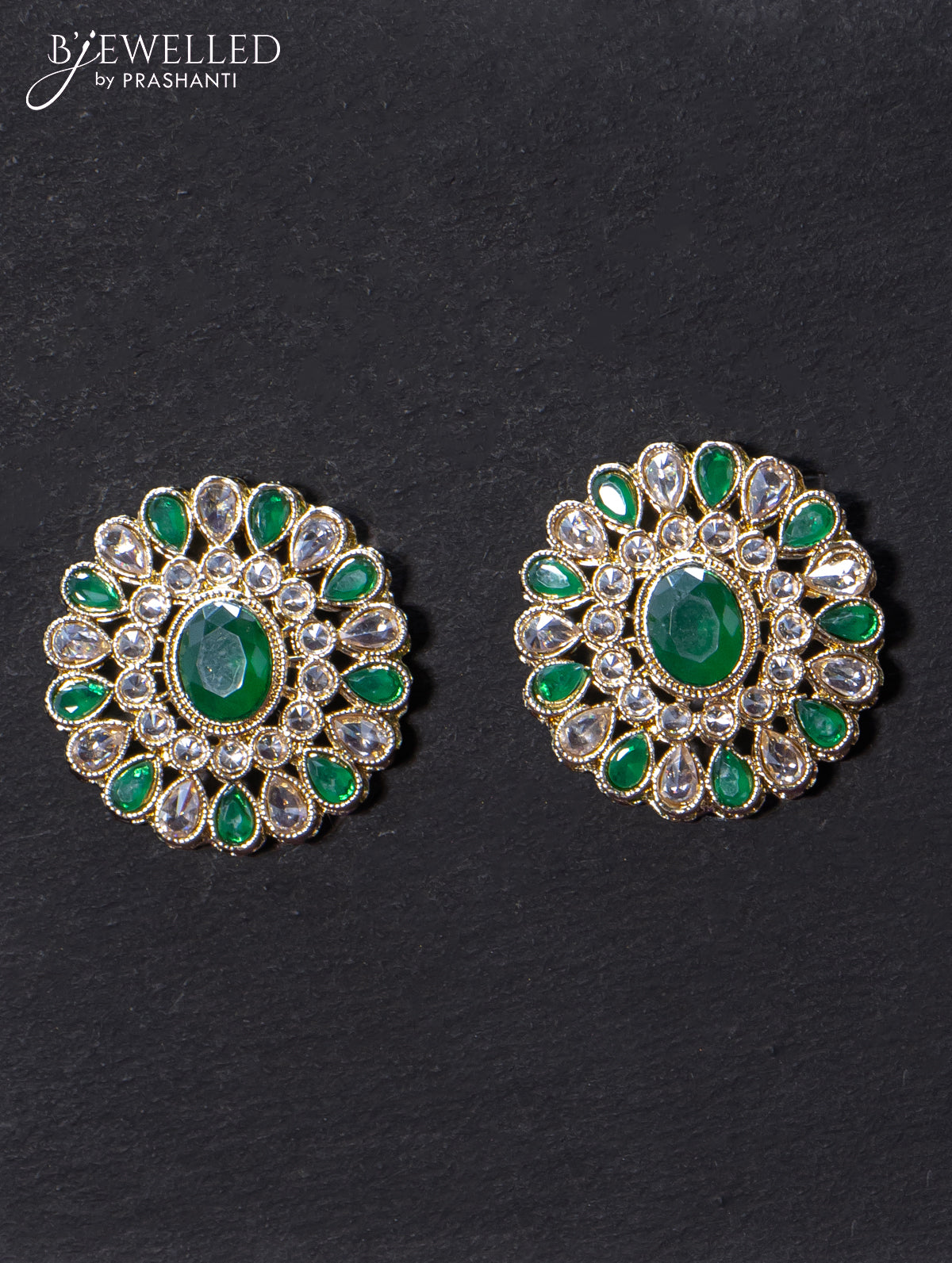 Light weight floral design earrings with cz and emerald stone