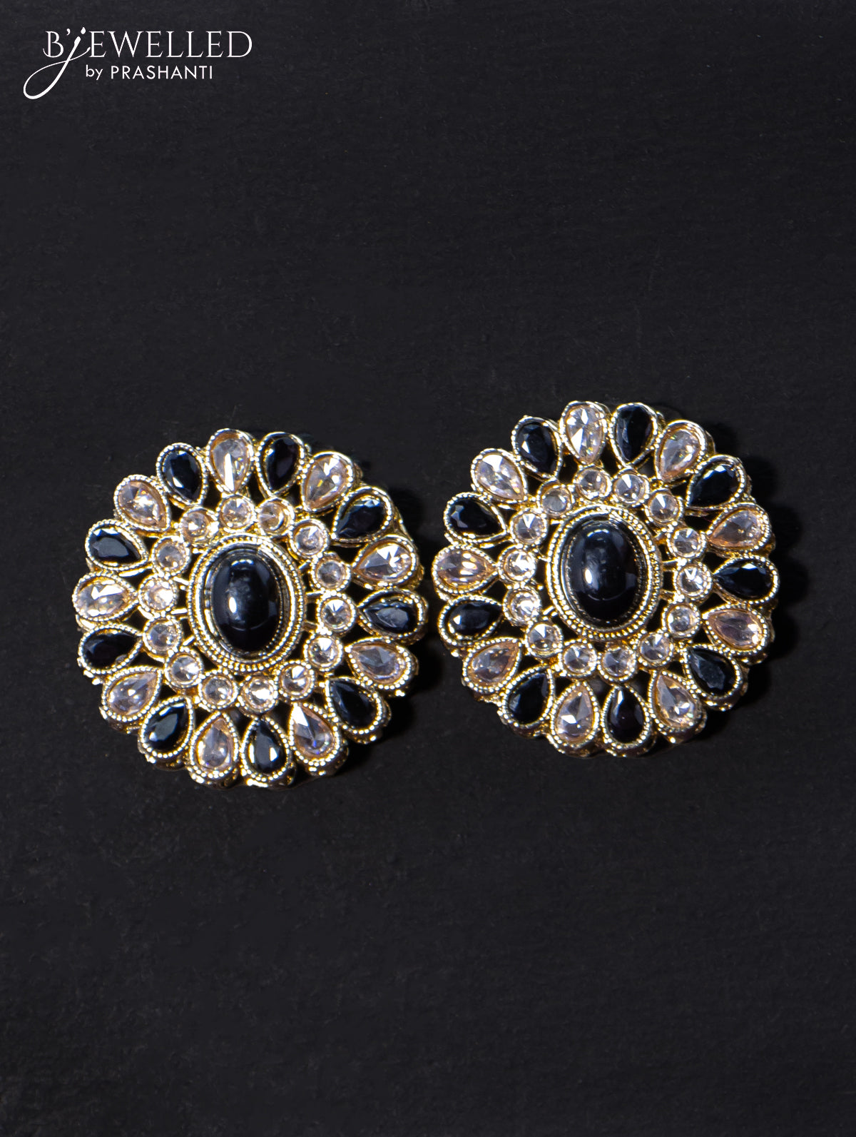 Light weight floral design earrings with cz and black stone