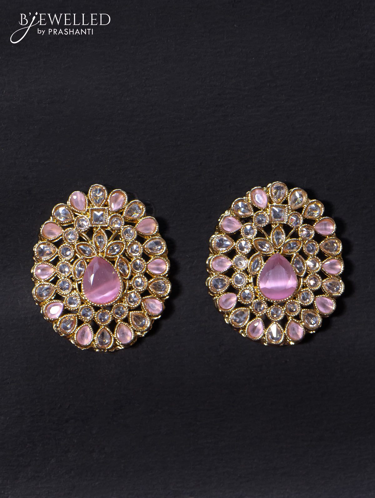 Light weight earrings with cz and baby pink stone