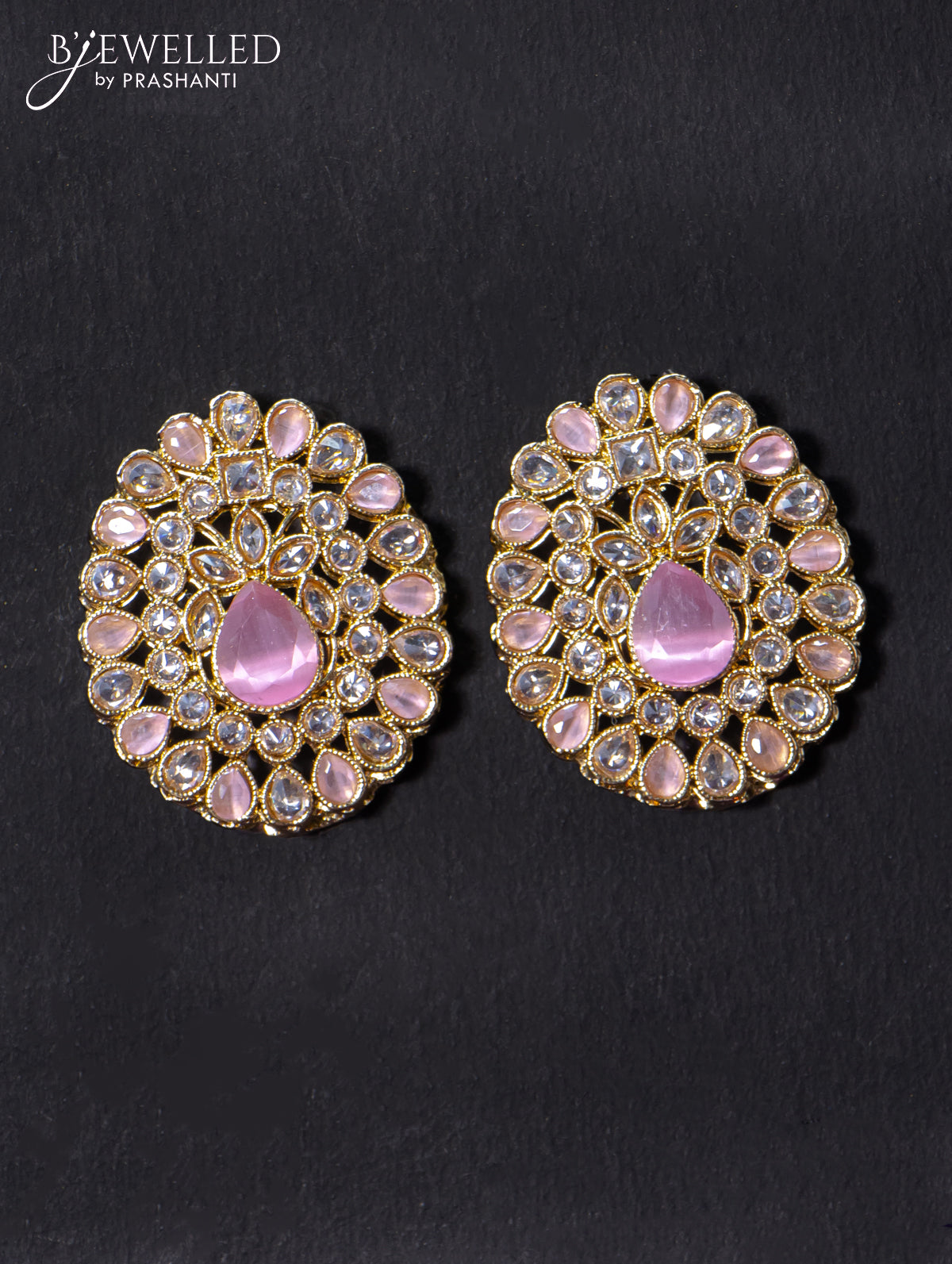 Light weight earrings with cz and pink stone