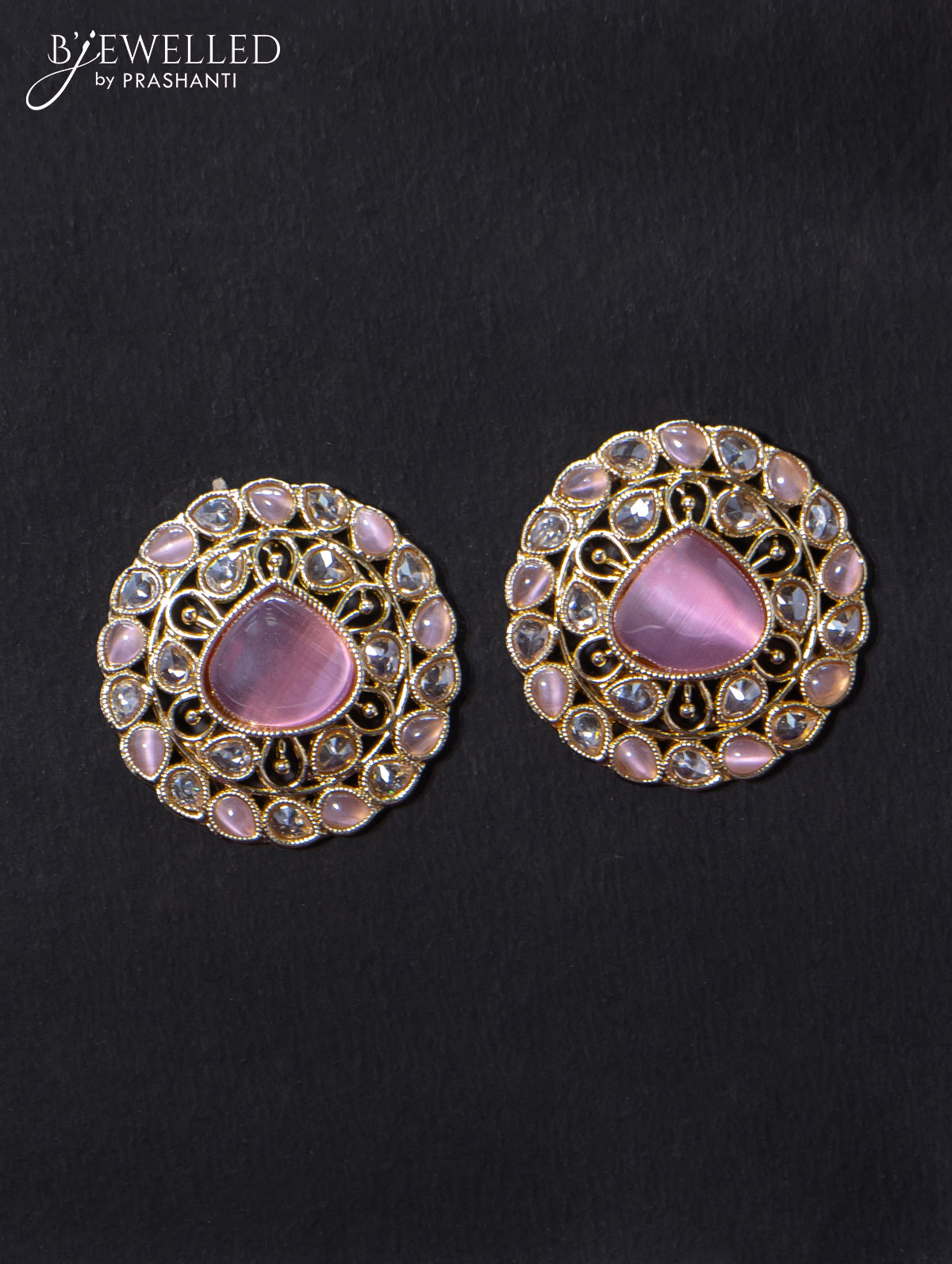 Light weight earrings with cz and baby pink stone