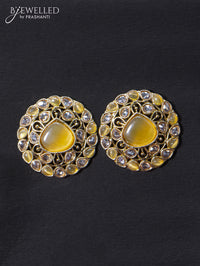 Light weight earrings with cz and yellow stone