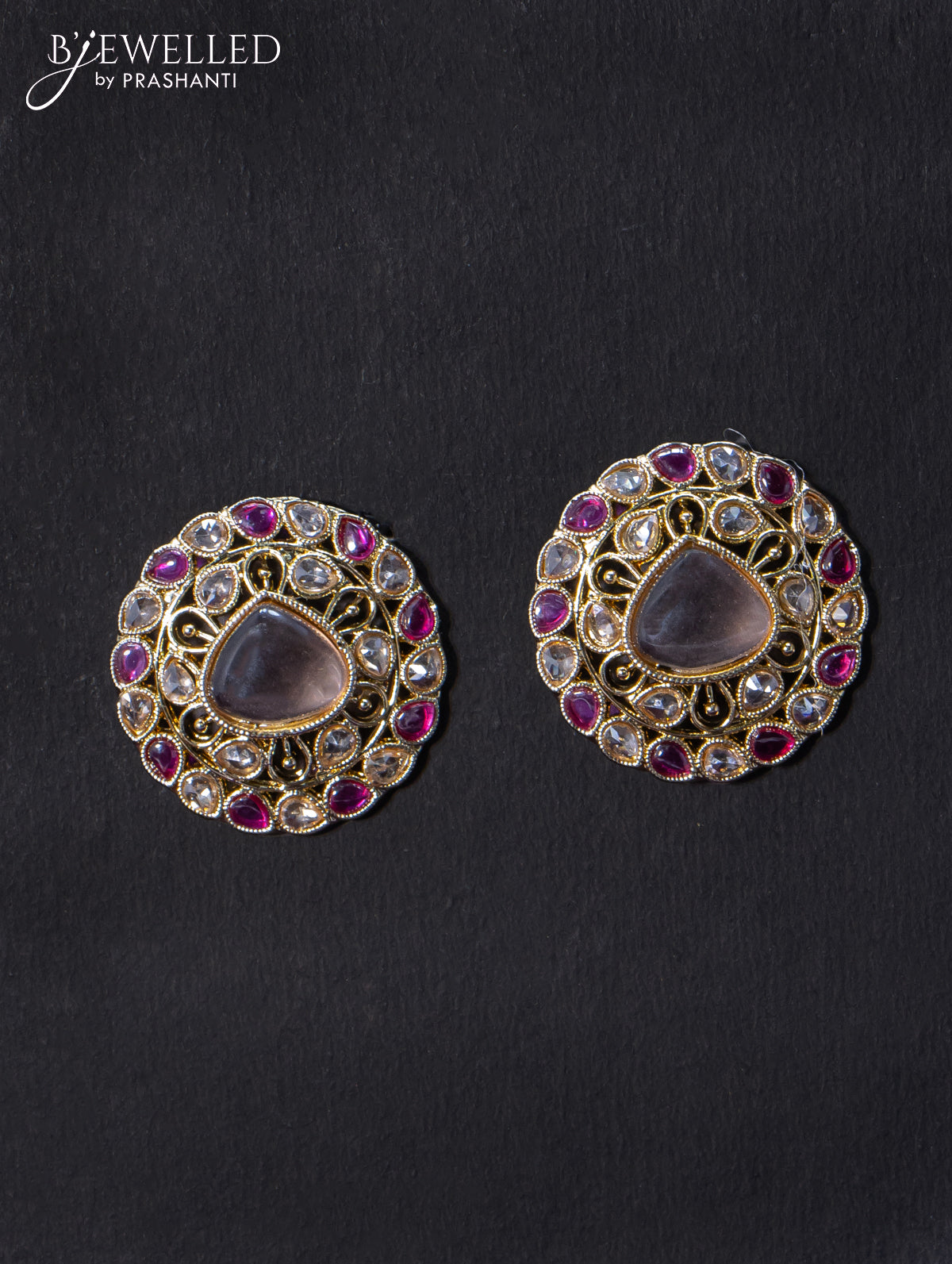 Light weight earrings with cz and pink stone