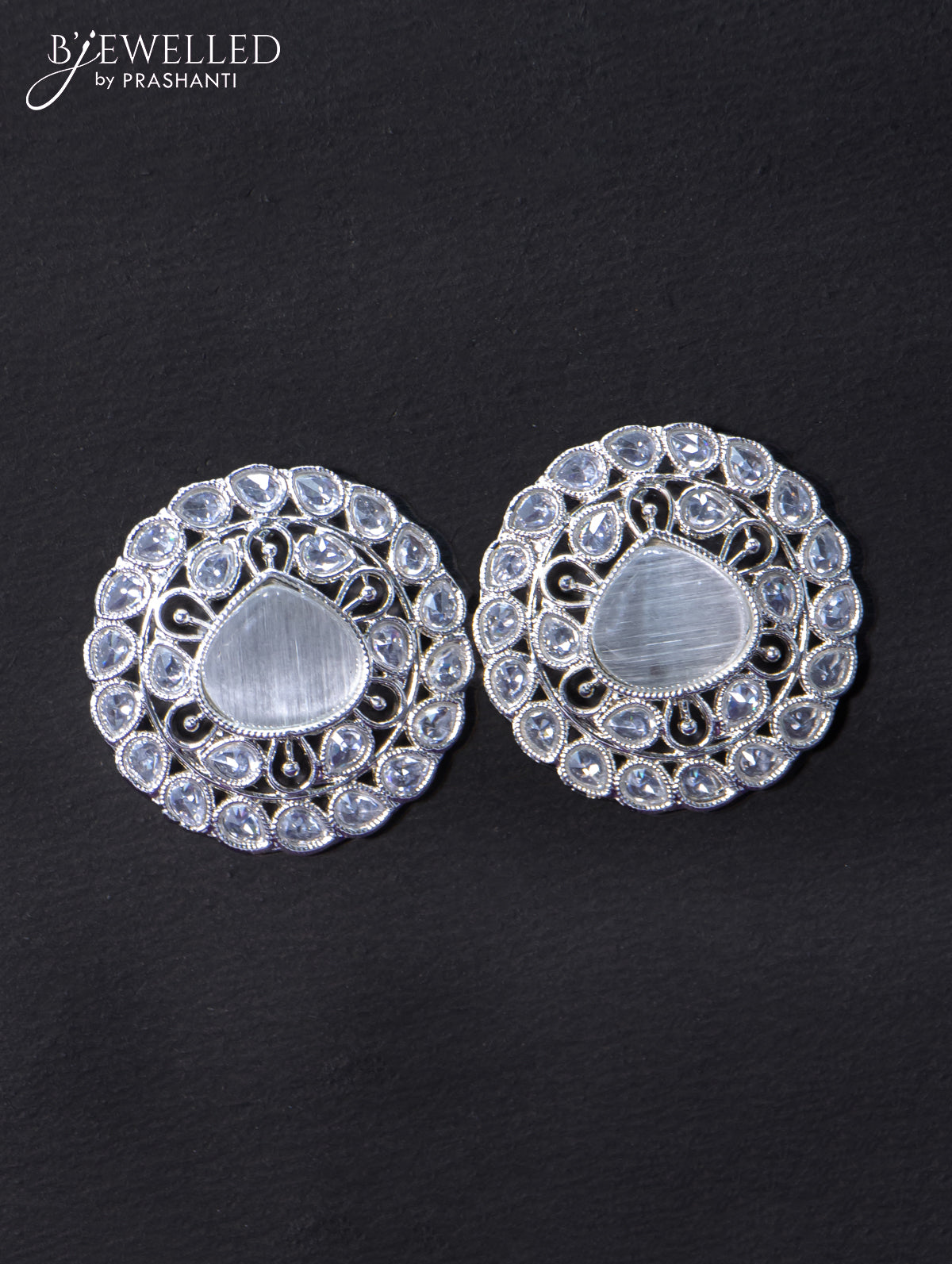 Light weight earrings with cz and white stone