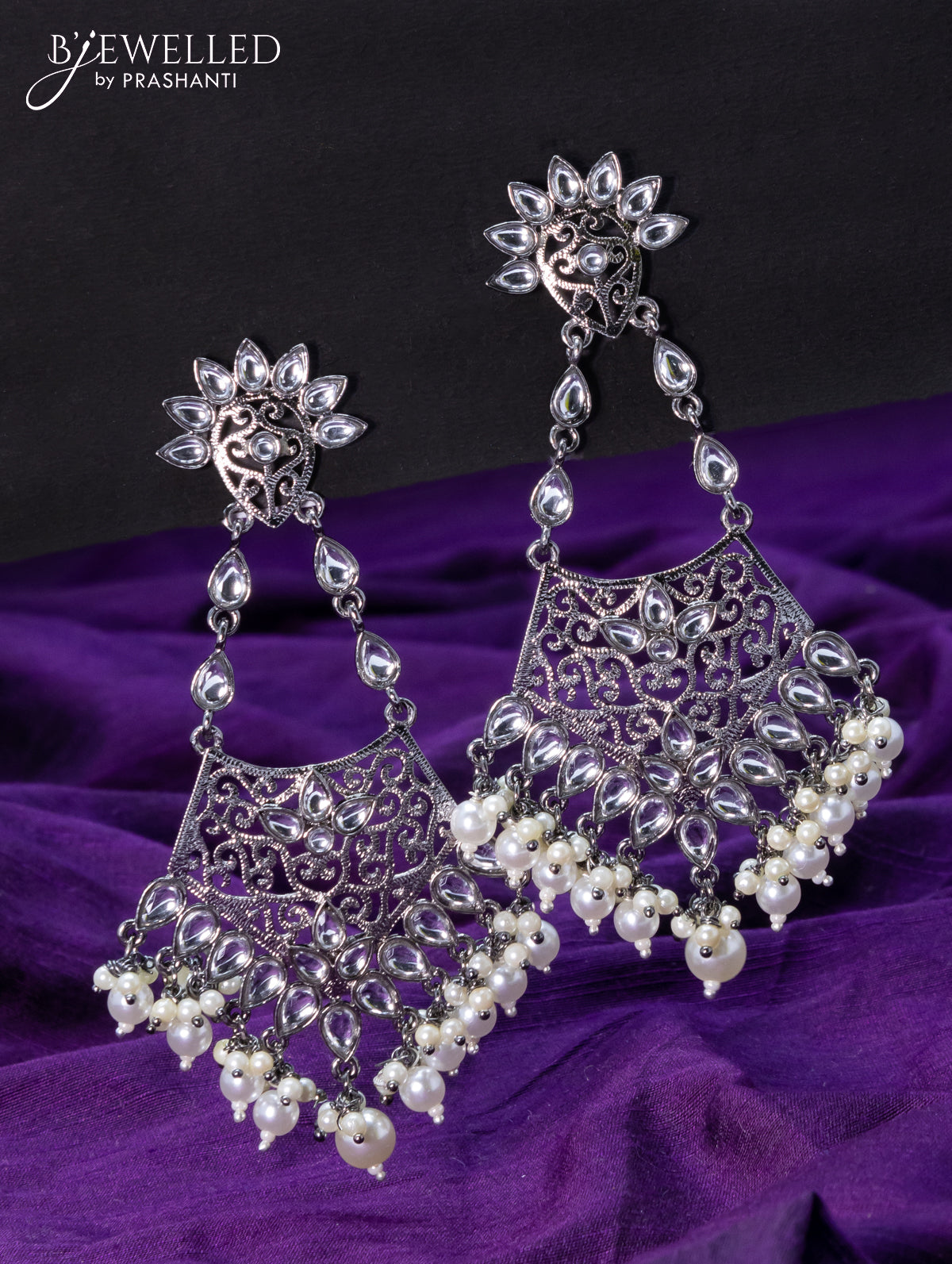 Light weight oxidised earrings with cz stone and pearl hangings