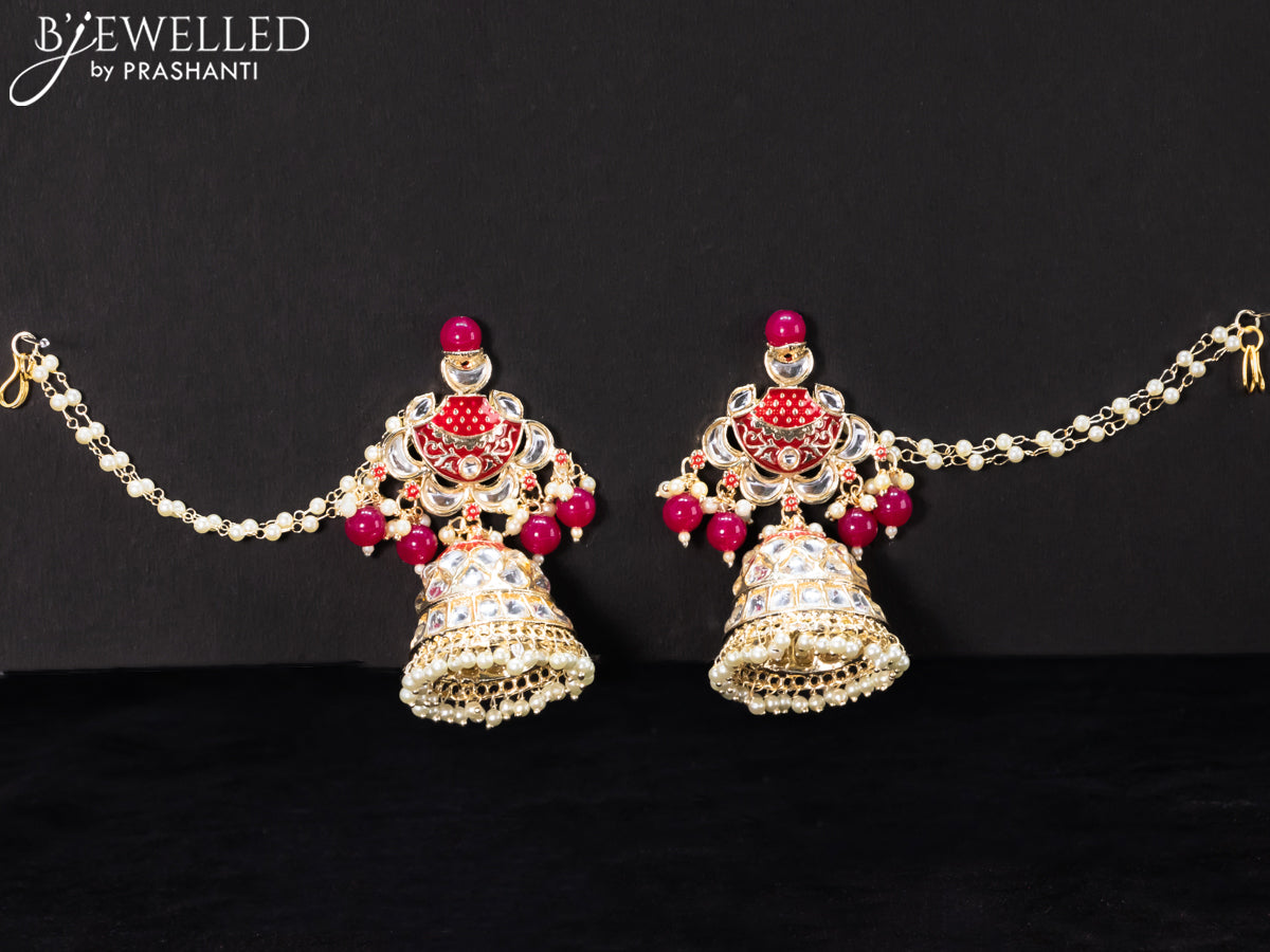 Light weight dark pink jhumkas with kundan stones and pearl maatal