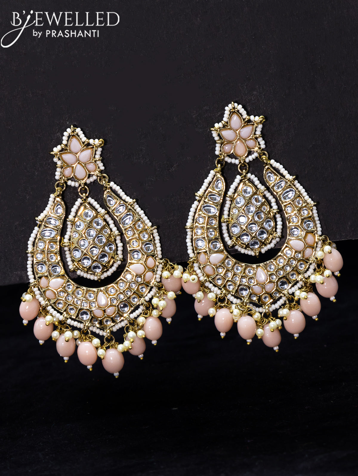 Light weight earrings peach and kundan stone with beads hangings