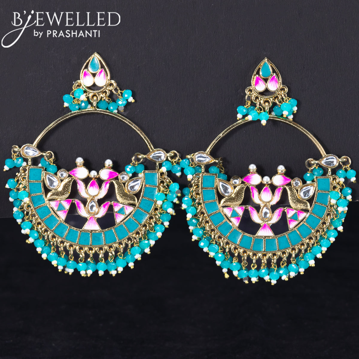 Light weight lotus design earrings with cz stone and teal blue beads hangings