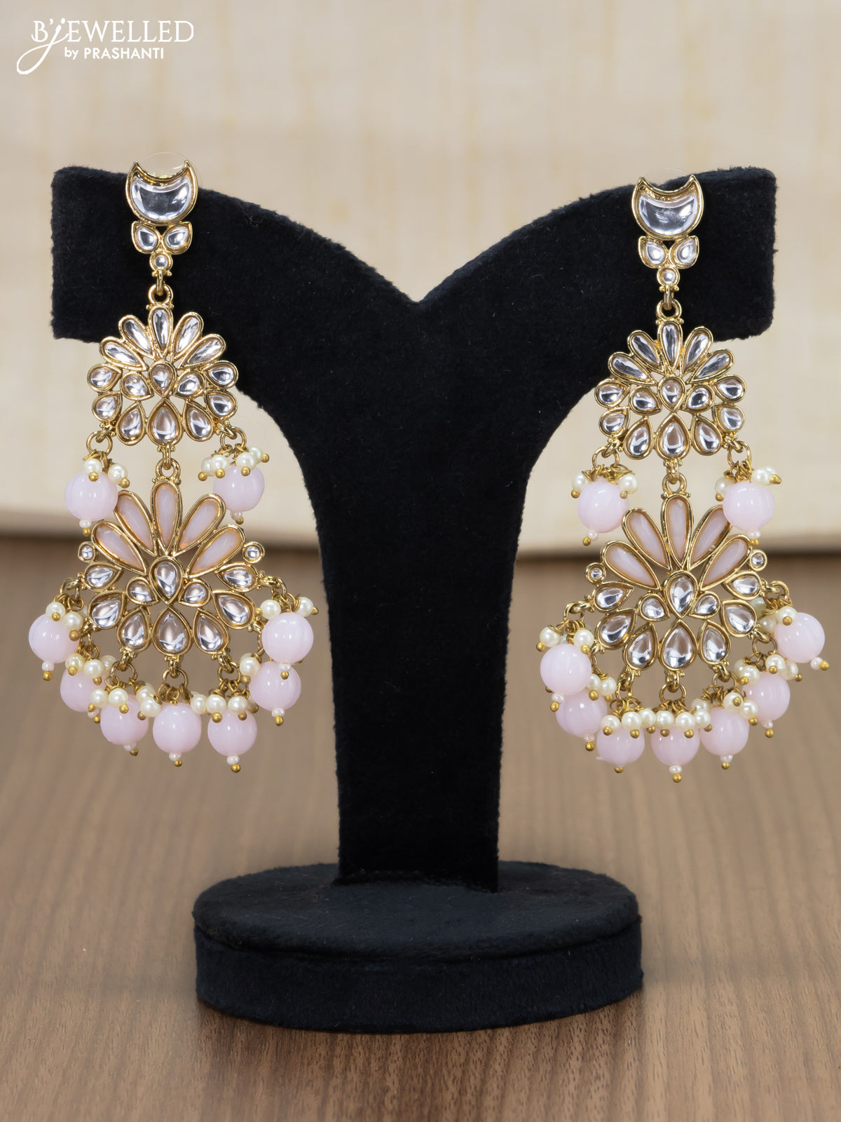 Light weight earrings with kundan stone and baby pink beads hangings