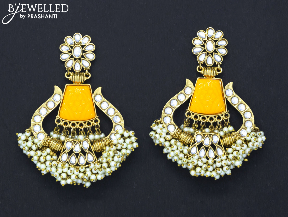 Dangler earrings yellow and cz stone with pearl hangings