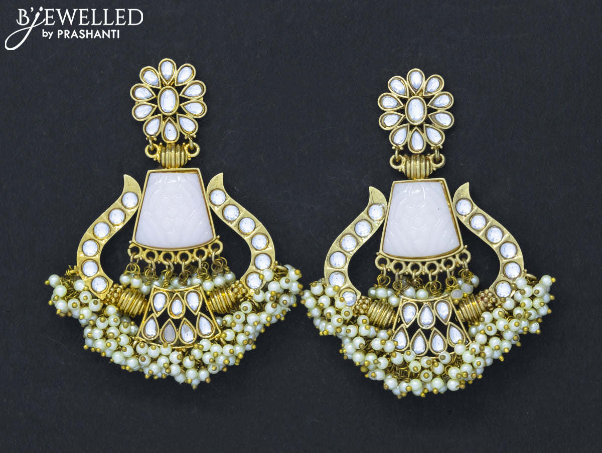 Dangler earrings with cz stone and pearl hangings