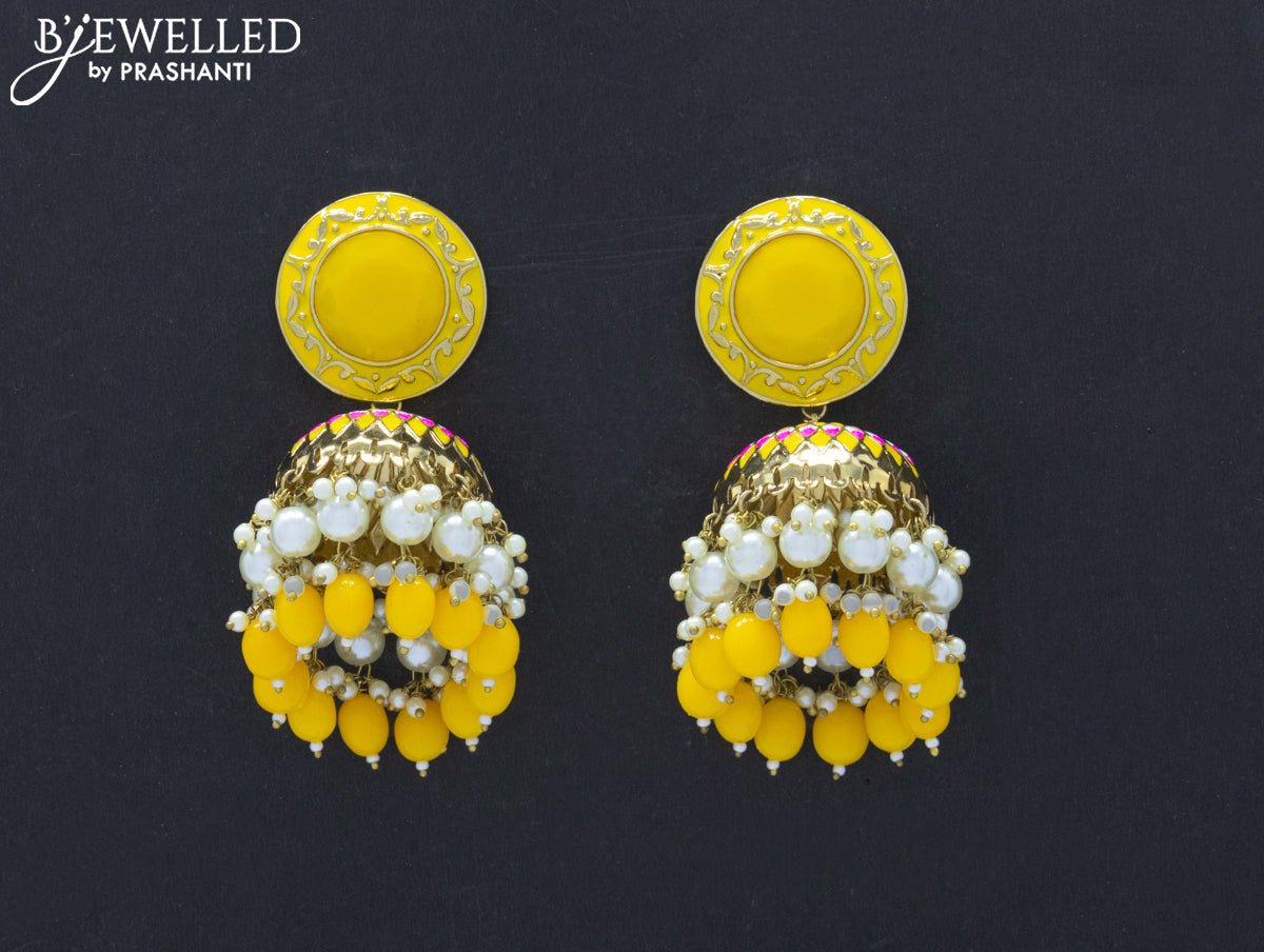 Dangler jhumkas with yellow stone and hangings