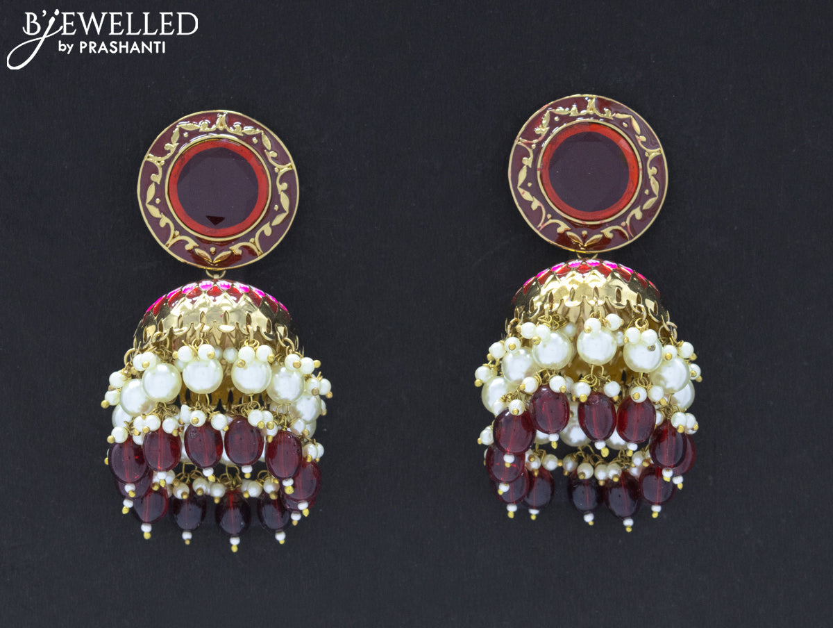 Dangler jhumkas with maroon stone and hangings