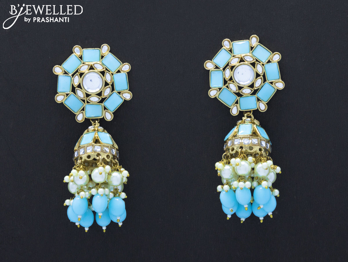 Dangler jhumkas with light blue stone and hangings