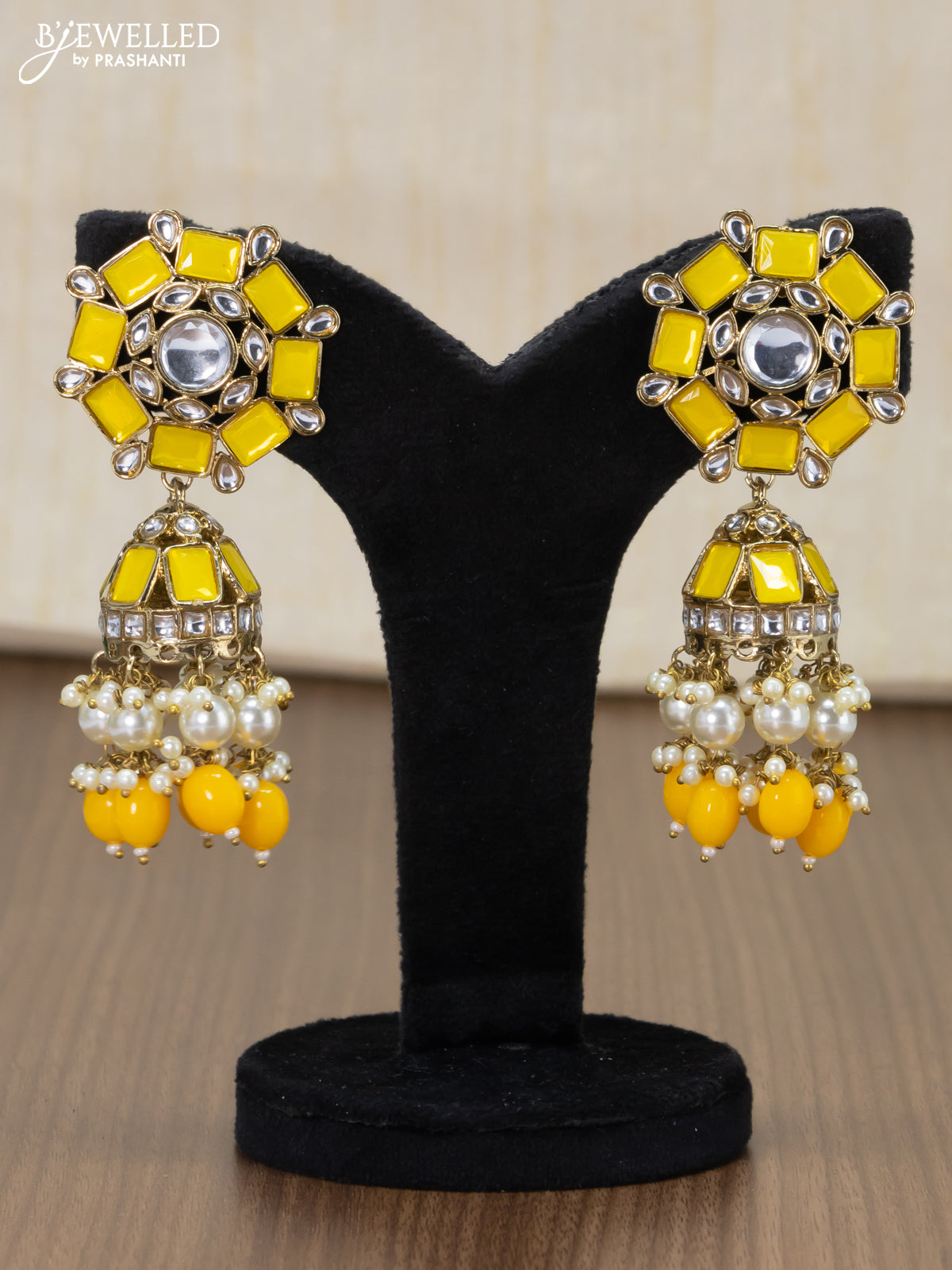 Dangler jhumkas with yellow stone and hangings