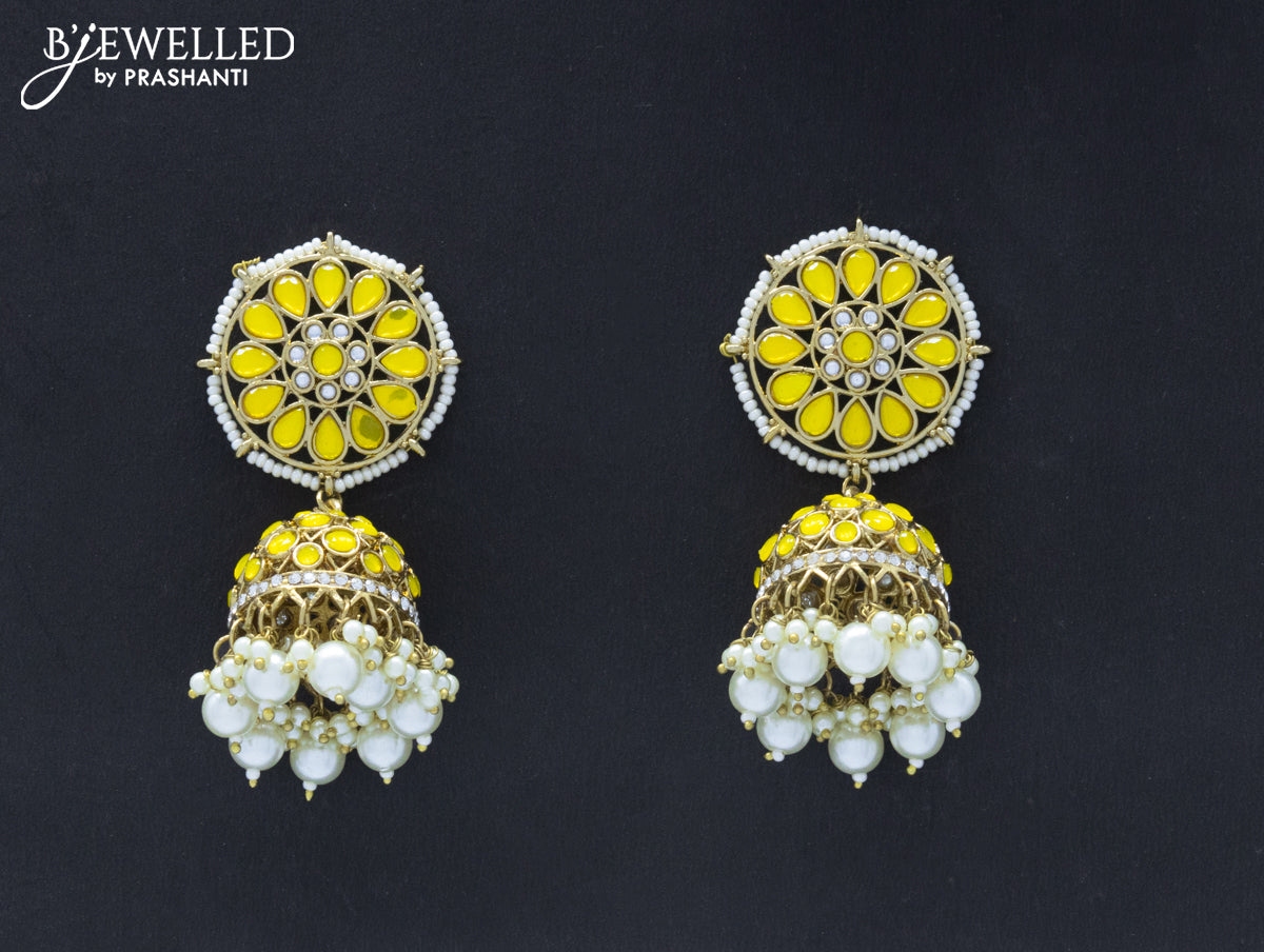 Dangler jhumkas with yellow stone and pearl hangings