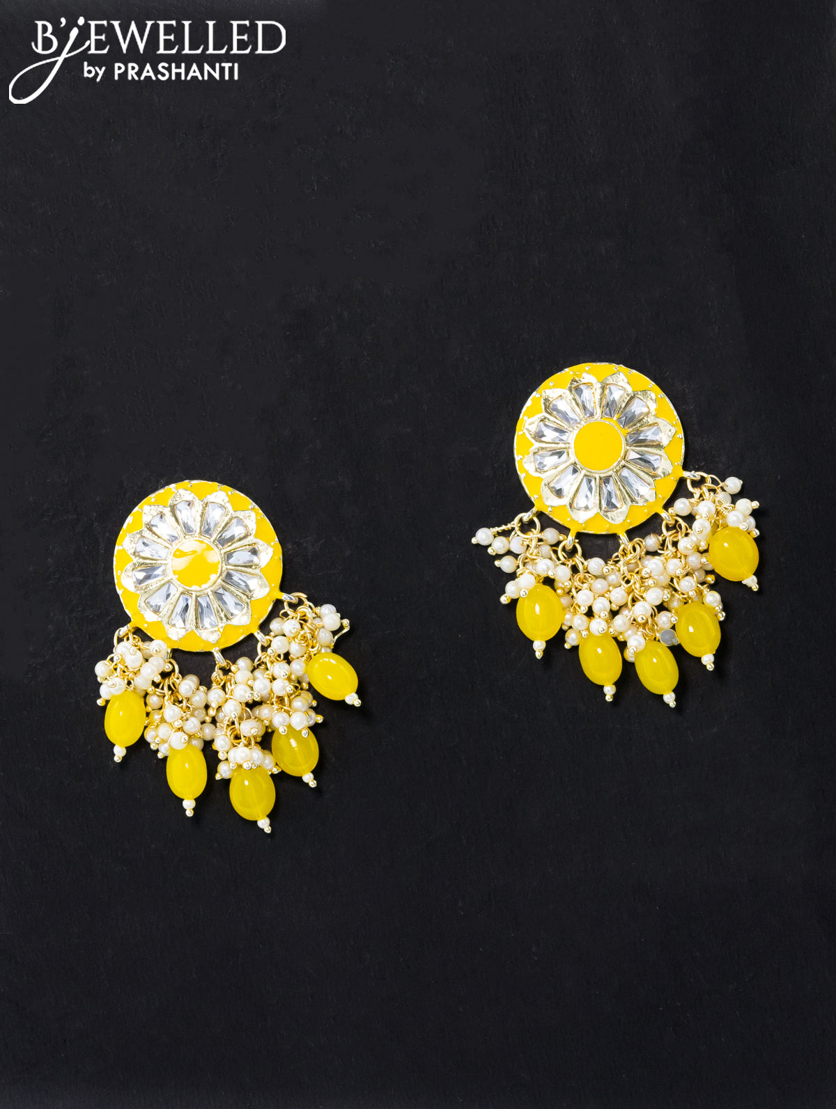 Dangler yellow earrings with hangings and pearl maatal