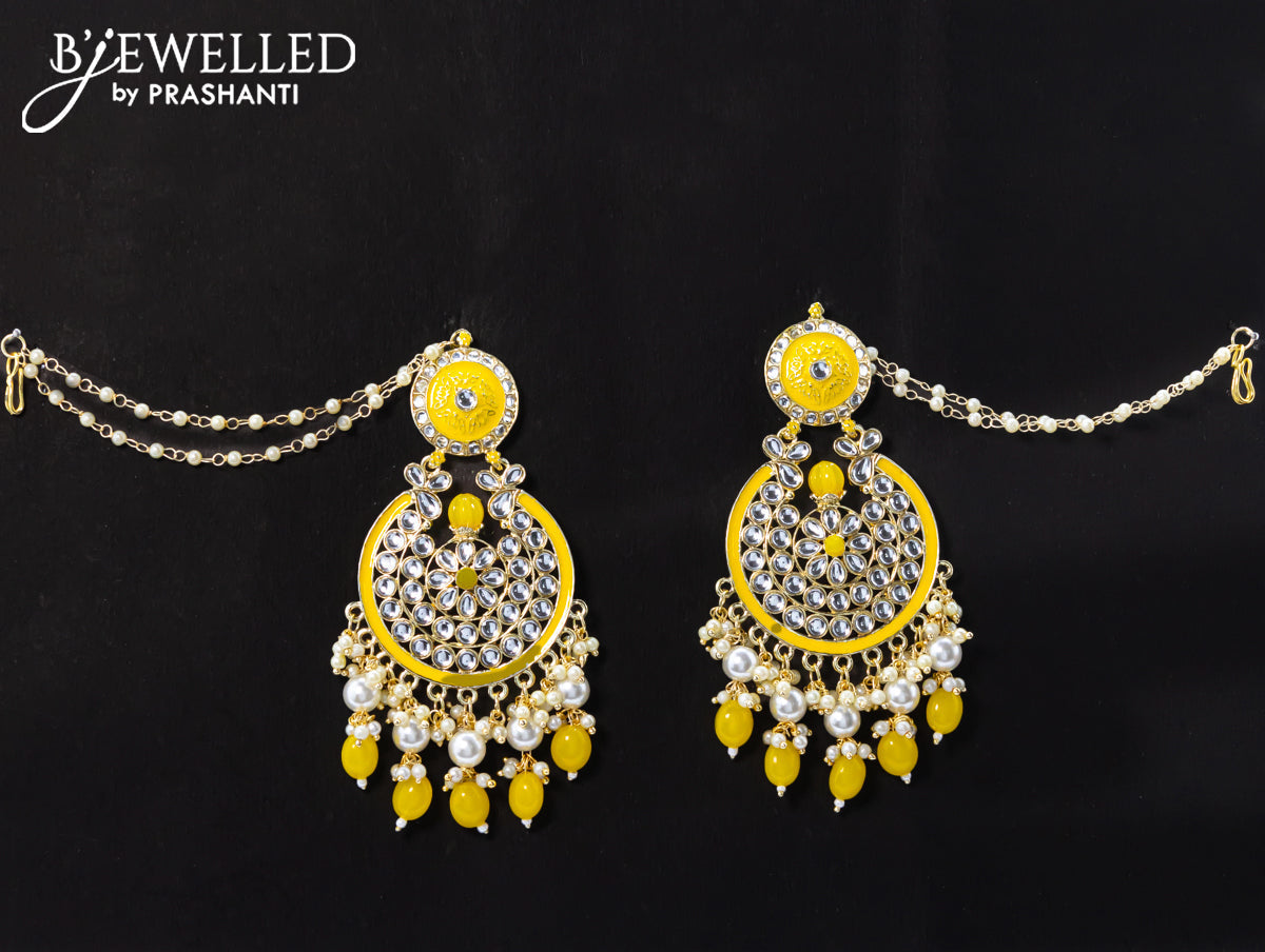 Dangler yellow earrings with hangings and pearl maatal