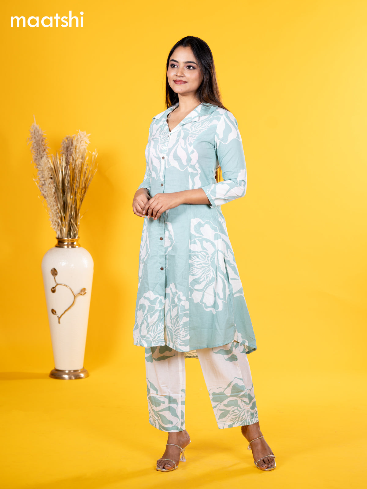 Cotton co-ord set pastel blue shade and off white with allover floral prints & collar neck pattern and straight cut pant