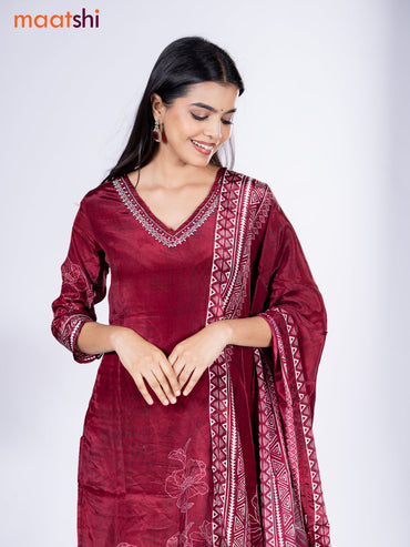 Crepe silk salwar suit deep maroon with placement prints & beaded work v neck pattern and straight cut pant & dupatta