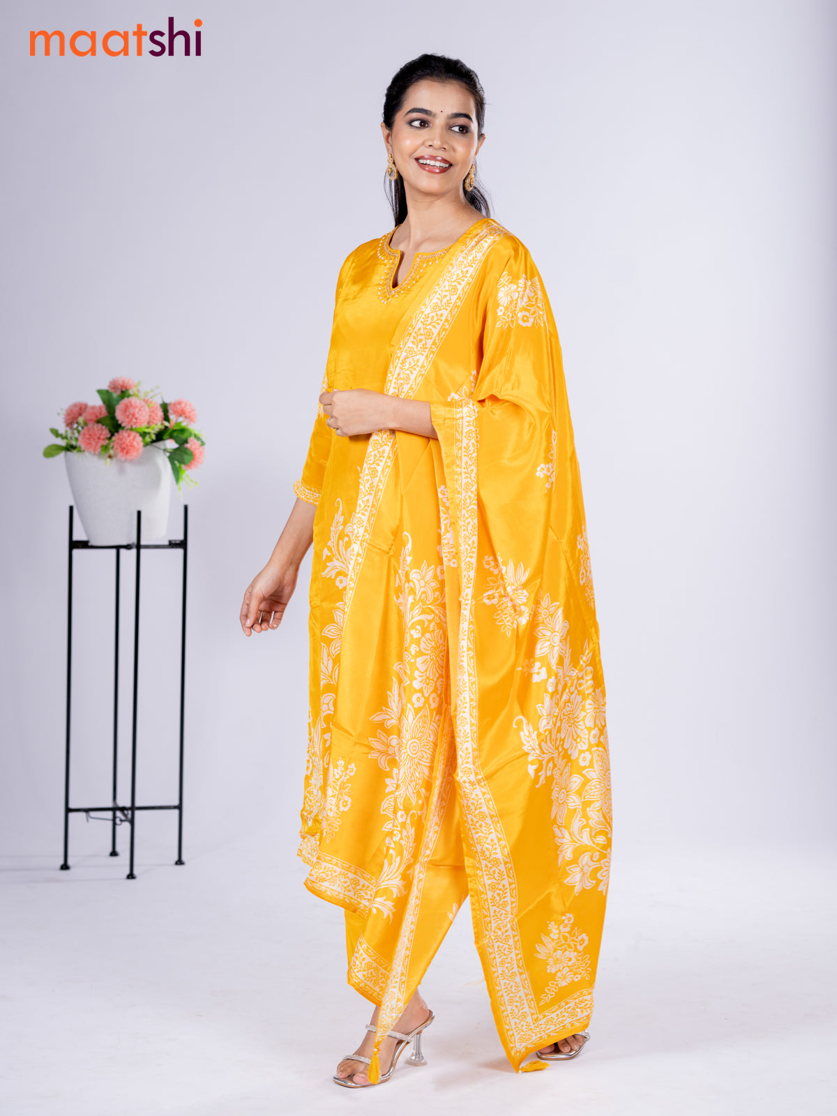 Crepe silk salwar suit mango yellow with placement prints & beaded work neck pattern and straight cut pant & dupatta