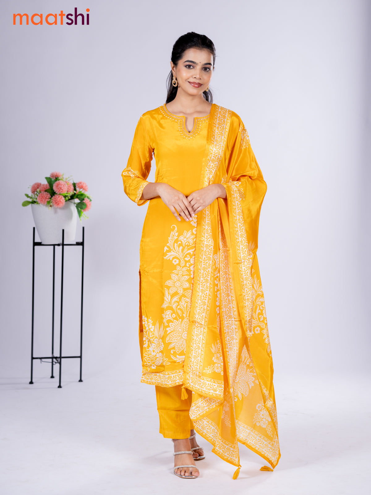 Crepe silk salwar suit mango yellow with placement prints & beaded work neck pattern and straight cut pant & dupatta