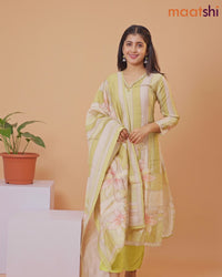 Rayon readymade salwar suit cream and light green with allover floral prints & embroidery mirror work v neck pattern and straight cut pant & dupatta