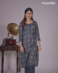 Rayon kurti navy blue with allover ikat prints & simple neck pattern and straight cut pant