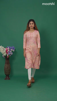 Cotton readymade kurti peach shade with allover floral prints & embroidery mirror work neck pattern without pant