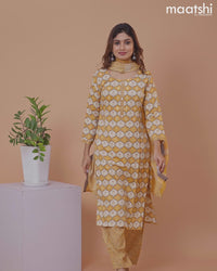 Rayon cotton salwar suit mustard yellow and off white with allover prints & mirror work neck pattern and straight cut pant & dupatta