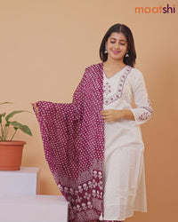 Cotton readymade salwar suit off white and wine shade with allover self emboss & embroidery work v neck pattern and straight cut pant & printed dupatta