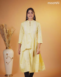 Rayon kurti pale yellow with embroidery work & simple neck pattern without pant