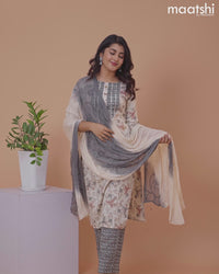 Rayon salwar suit cream and dark grey with allover prints & gotapatti lace work neck pattern and straight cut pant & chiffon embroidery work dupatta