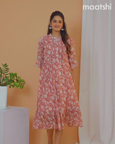 Chiffon dress peach shade with allover floral prints & simple neck pattern without pant