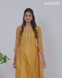 Chanderi floor length dress mustard shade with allover geometric prints & embroidery patch work neck pattern without pant