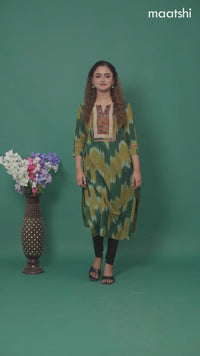 Cotton readymade kurti green and mustard shade with allover ikat prints & ajrakh patch work neck pattern without pant