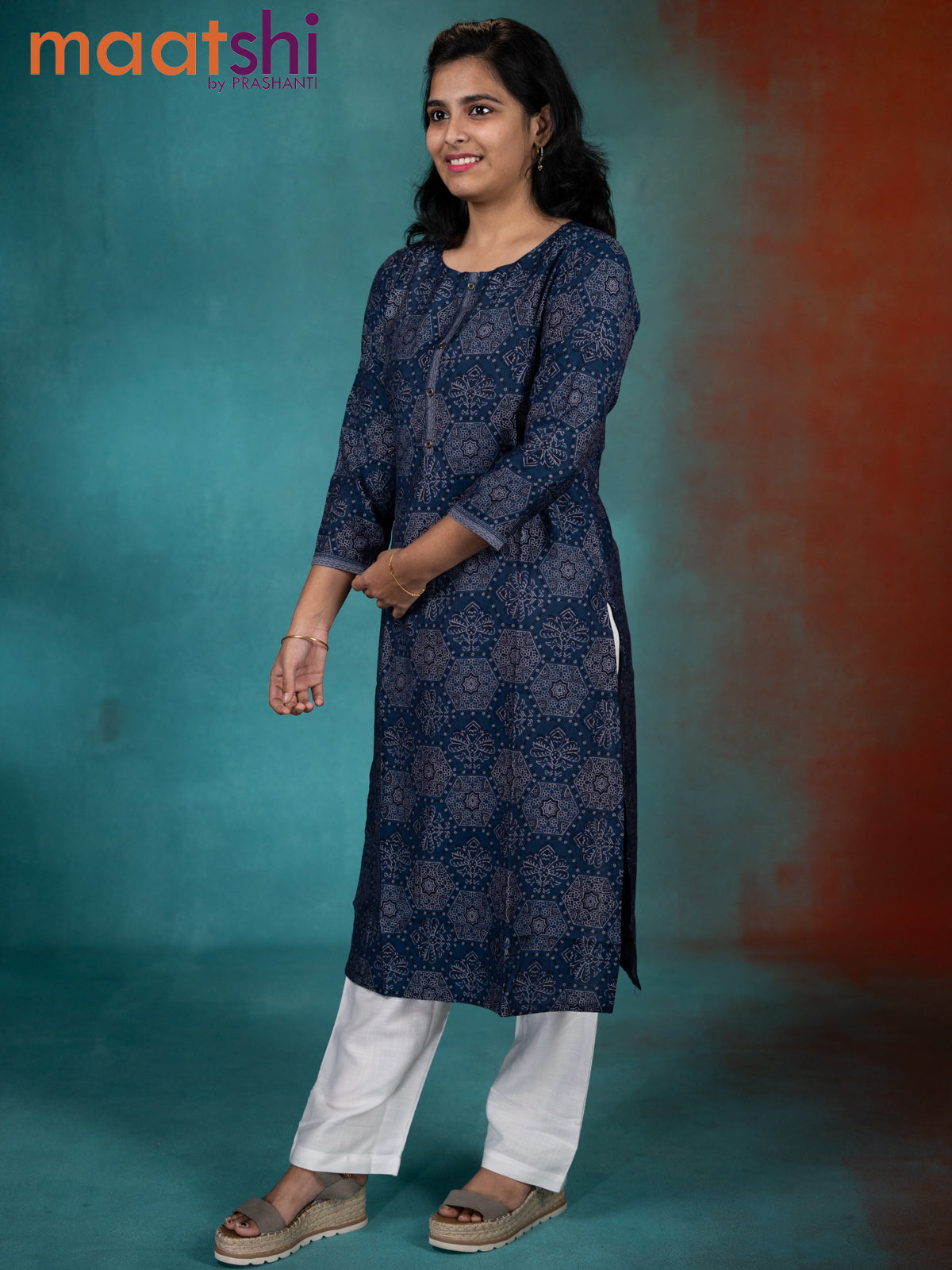 Muslin readymade kurti indigo blue with allover ajrakh prints & simple neck pattern without pant