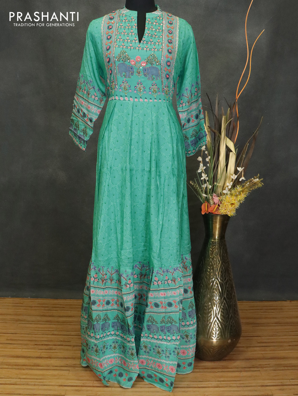 Muslin readymade umberlla kurti teal green with allover floral prints & chamki neck pattern