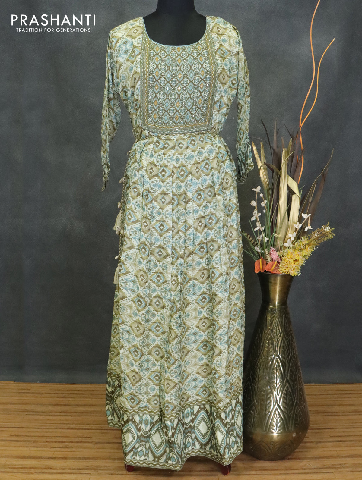 Muslin readymade umberlla kurti pastel green with allover prints & beaded neck pattern