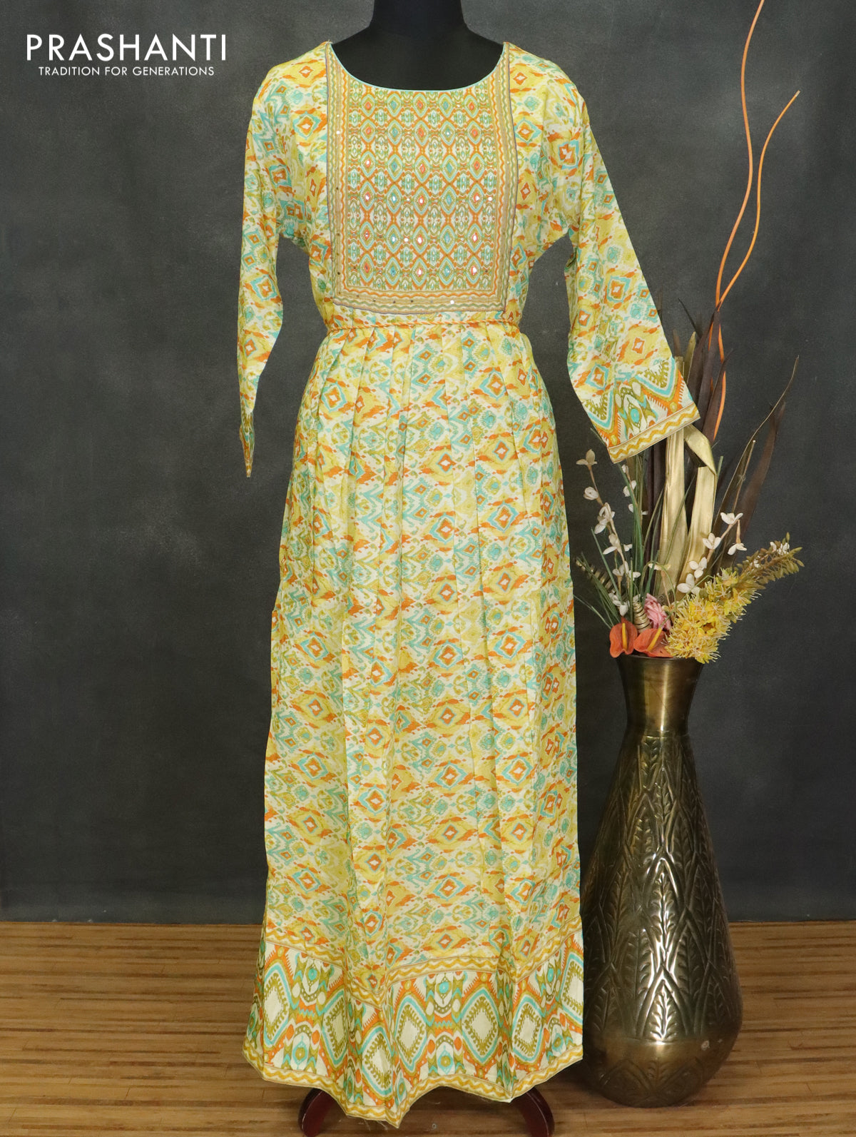 Muslin readymade umberlla kurti yellow shade with allover prints & beaded neck pattern