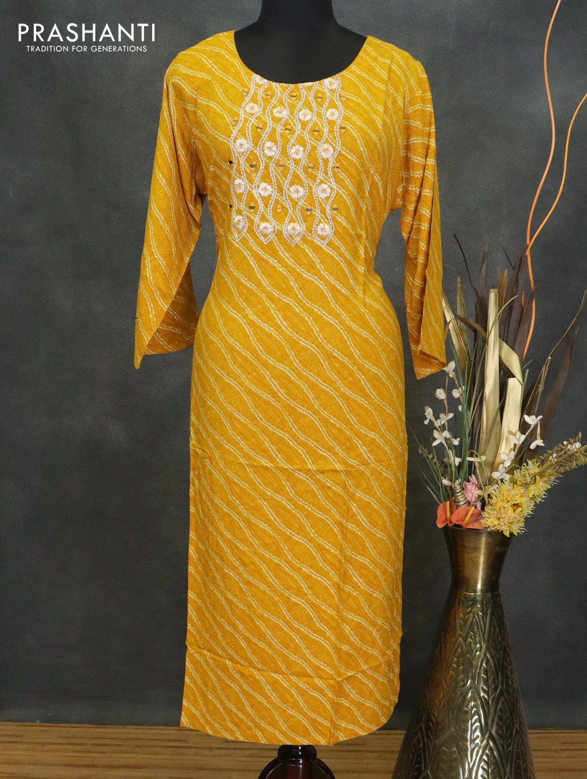 Modal readymade kurti mustard yellow with allover bandhani prints & mirror neck pattern