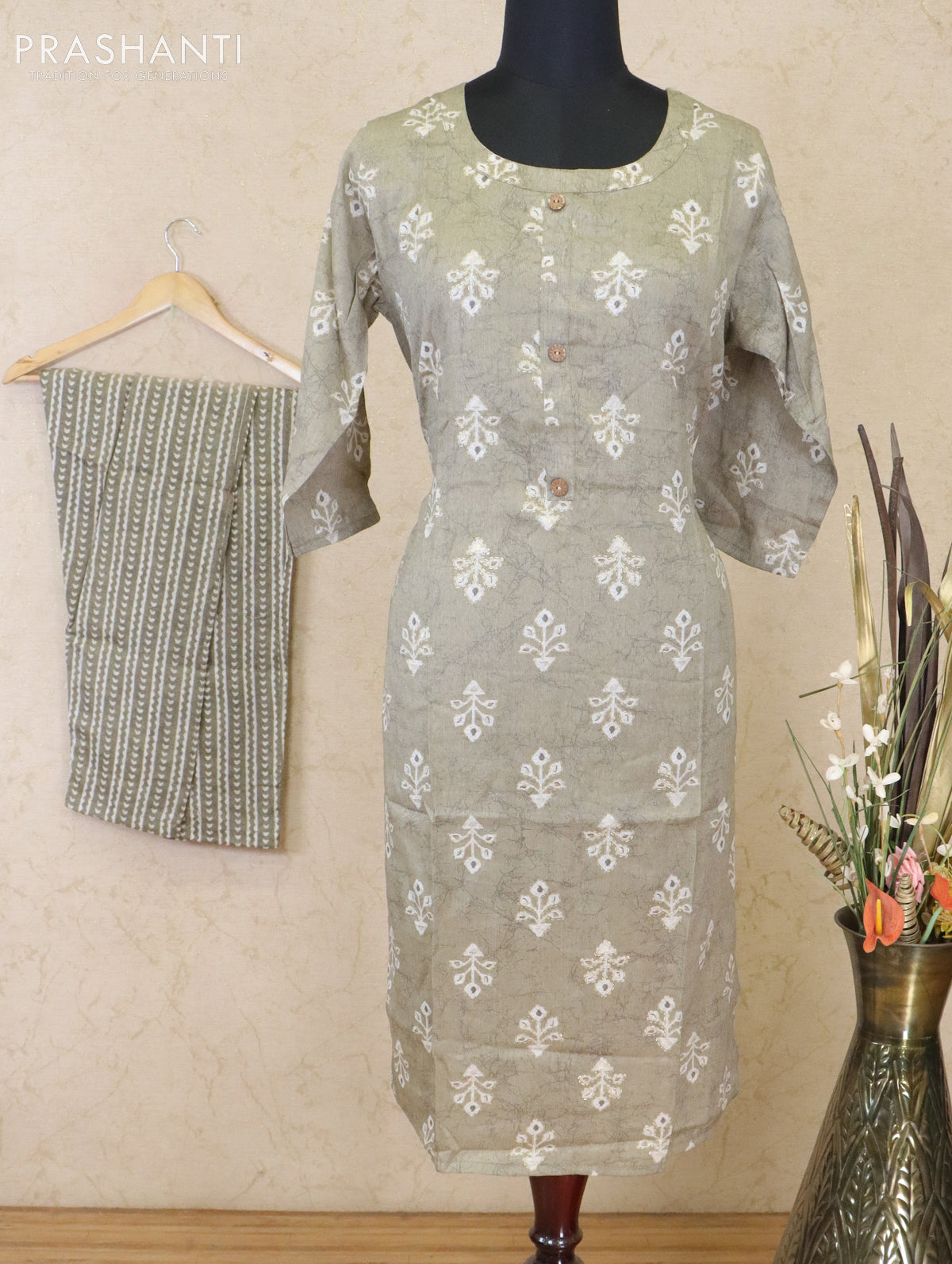 Slub cotton readymade kurti elaichi green shade with butta prints & patch work neck pattern and straight cut pant