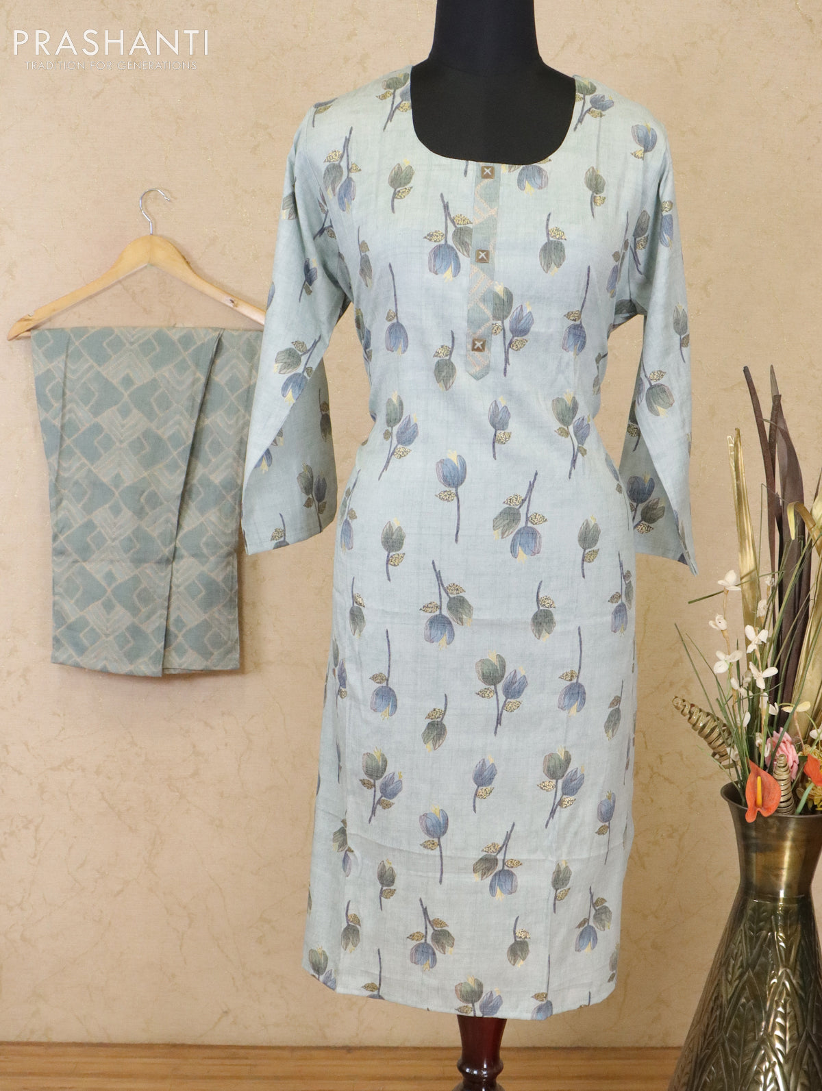 Slub cotton readymade kurti pastel blue shade with floral butta prints & patch work neck pattern and straight cut pant