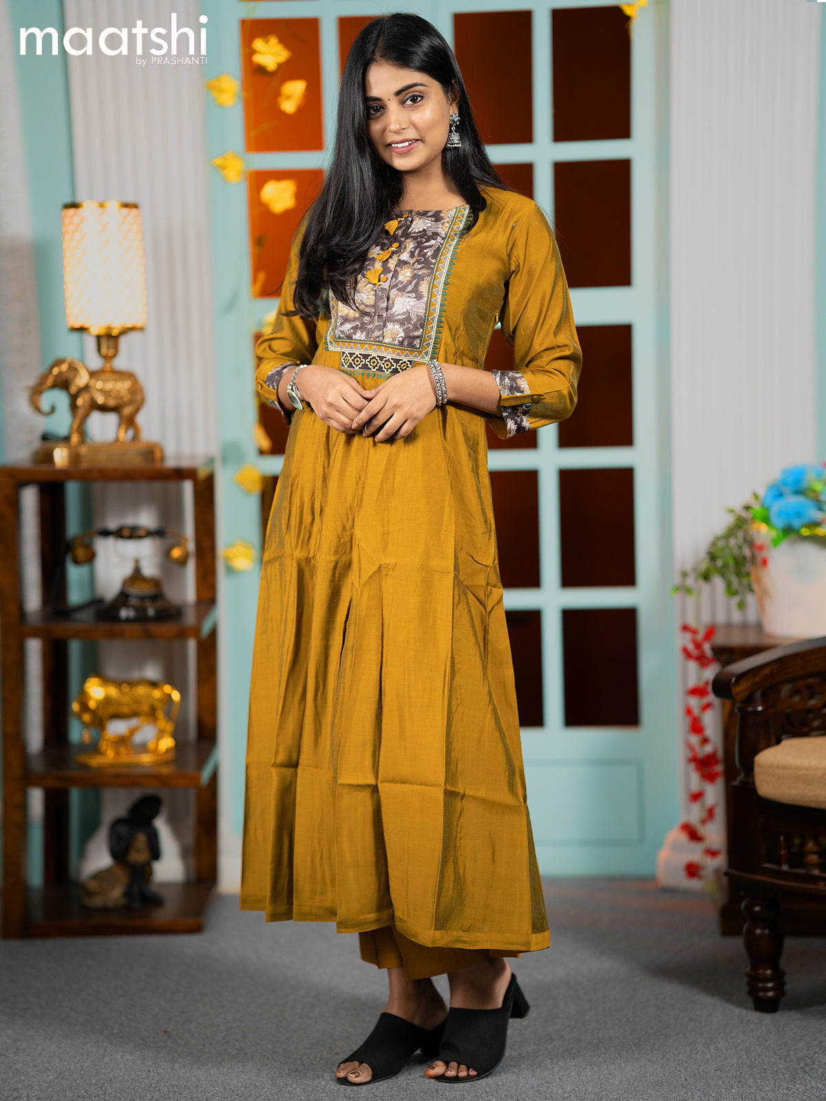 Muslin readymade umbrella kurti mustard yellow with embroidery work neck pattern and straight cut pant