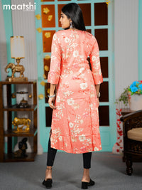 Rayon readymade A-line kurti peach orange with allover floral prints & simple neck pattern without pant