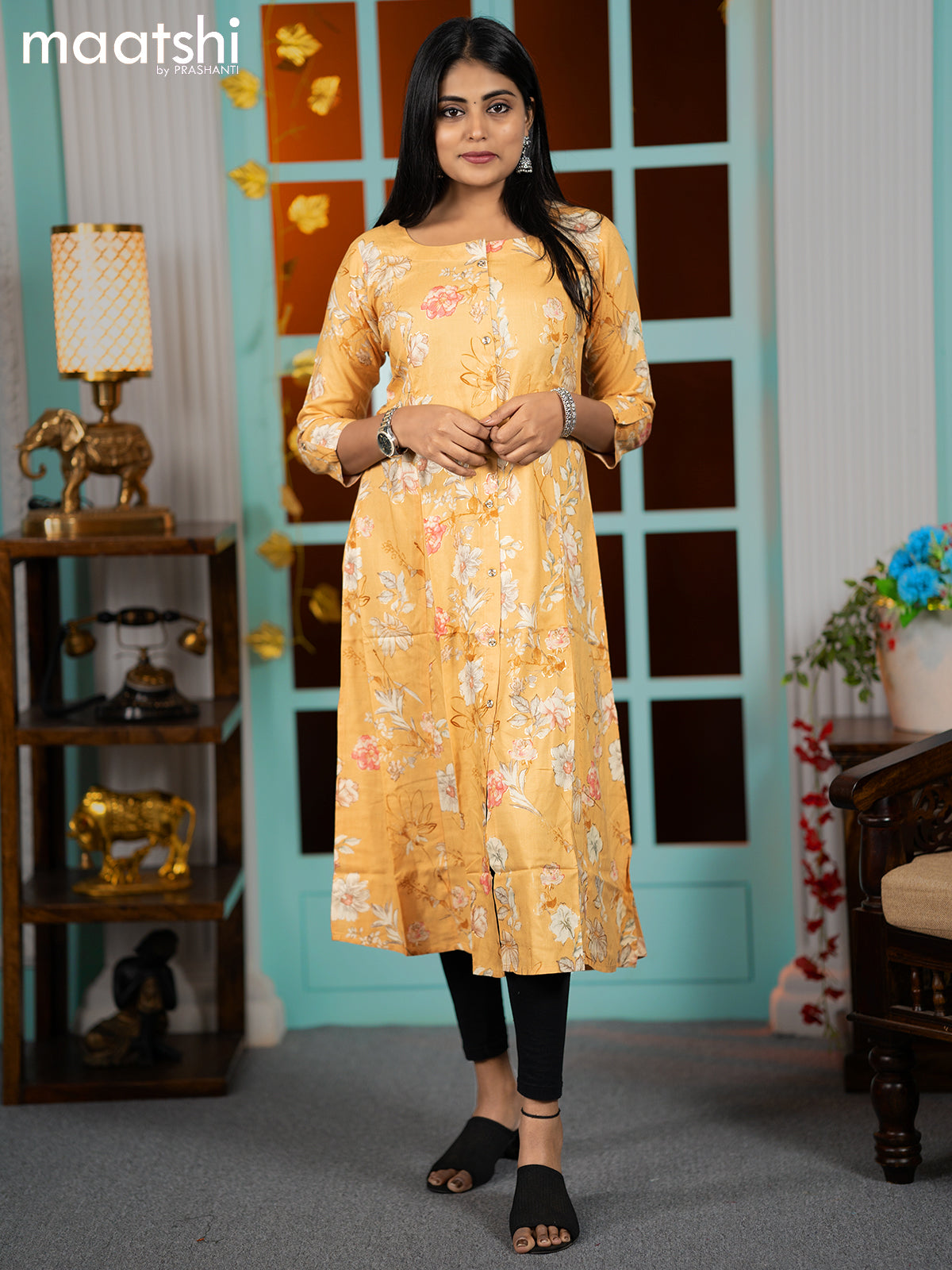 Rayon readymade A-line kurti mustard shade with allover floral prints & simple neck pattern without pant